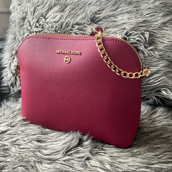 Michael Kors Handbags - NWT authentic MK leather crossbody dark berry